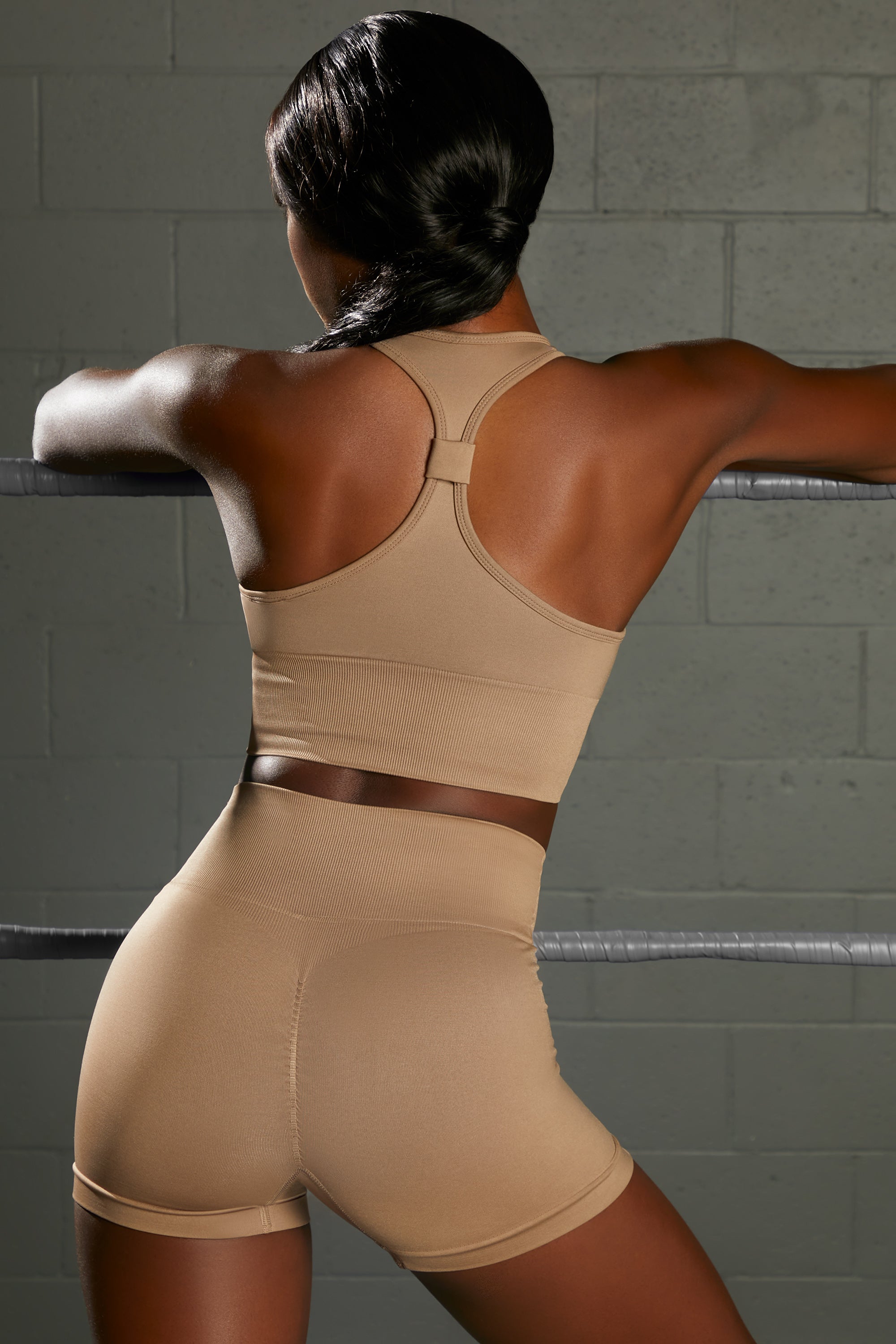 Overhaul Racer Knot Back Seamless Crop Top in Brown